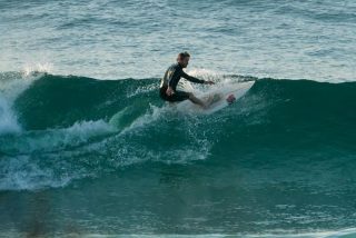 south curl curl beach surfer